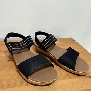 Skechers | Black Low Wedge Sandals with Simulated Cork Sole
